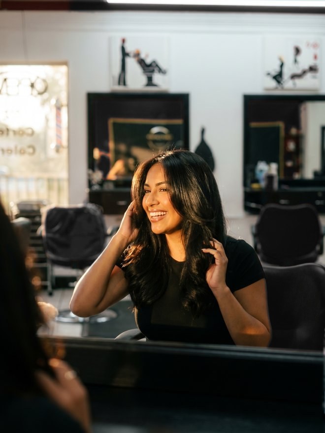 Fresh blowout, happy guest at a Naples FL salon